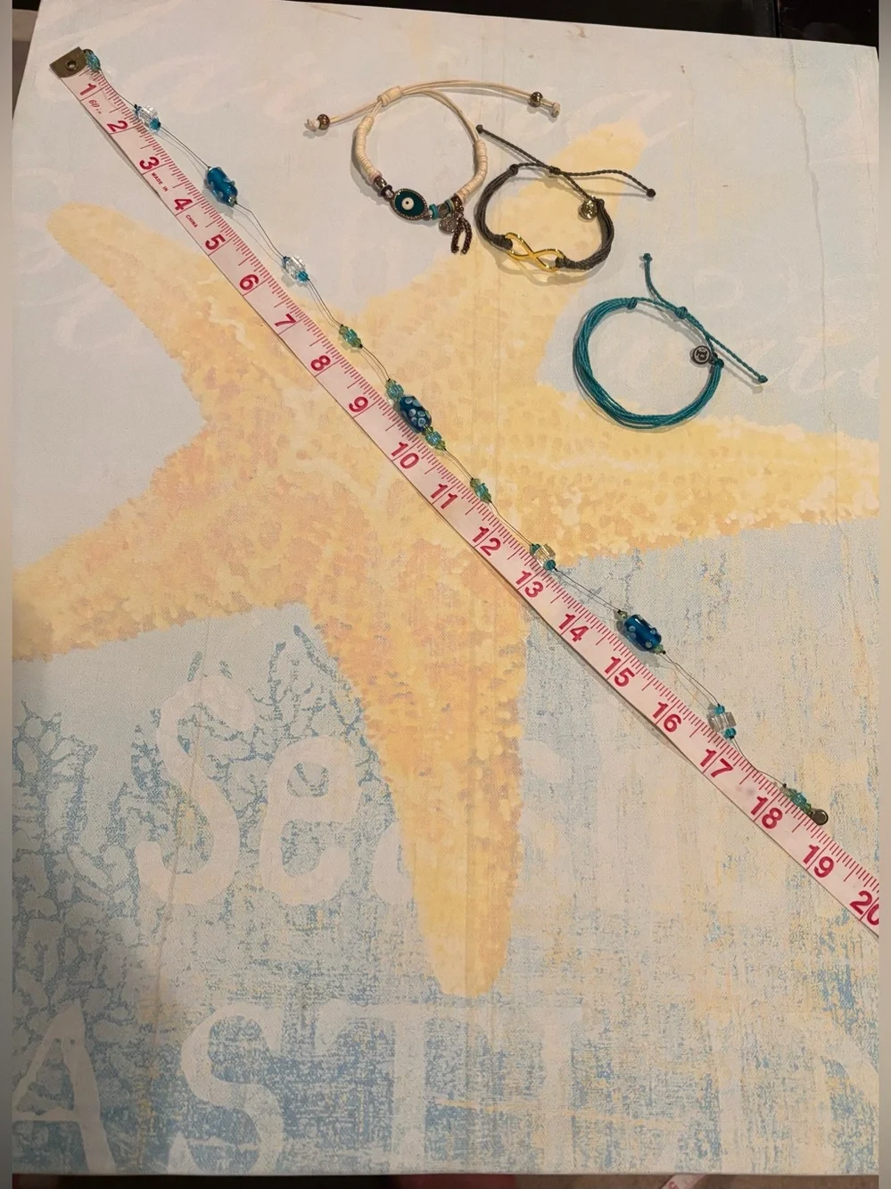 3 cord bracelets. 1 beaded Necklace. Pura Vida and evil eye bracelet. $18.00